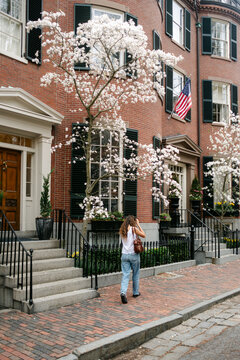 Young woman in street in Beacon Hill in Boston, New England 