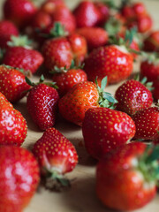 Fresh Strawberries on Wooden Table - Vertical Close Up
