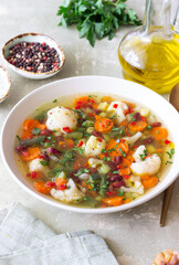 Vegetable soup with cauliflower, beans, carrots and zucchini. Healthy eating. Vegetarian food.