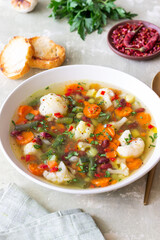 Vegetable soup with cauliflower, beans, carrots and zucchini. Healthy eating. Vegetarian food.
