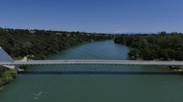 Redding California Sundial Bridge and Sacramento River aerial view 4k drone video