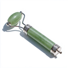 A jade facial roller with metal fittings