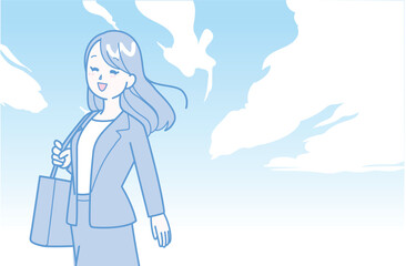 爽やかに晴れた空とスーツの女性
