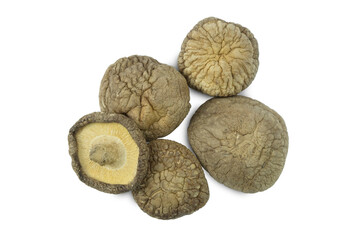 Group of dried shiitake mushrooms isolated on white background top view flat lay with clipping path stack 