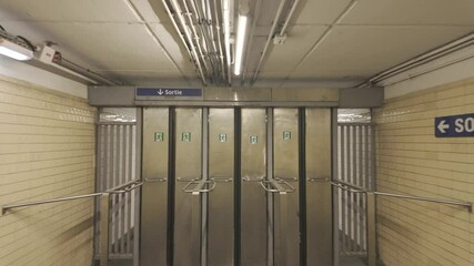 Paris,France - May 19, 2025: Automatic exit doors of Paris Metro station