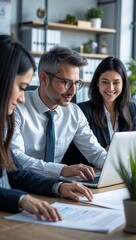 Collaborative Office Scene with Professionals Working Together in a Bright, Modern Space