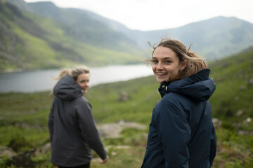 Two women hiking in the scenic mountains of North Wales