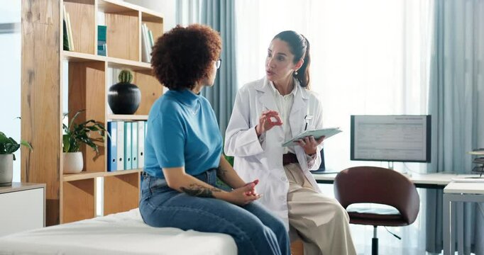 Tablet, doctor and advice with women in office for healthcare exam, patient history and checkup. Digital records, medical diagnosis and help with people in clinic for symptoms survey and report