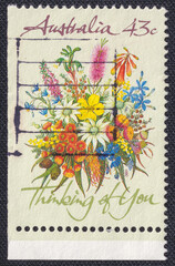 A bouquet of beautiful wildflowers and the inscription Thinking of You on a 1990 Australia postage...