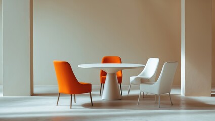 Obraz premium Chairs and a table set against a white wall with blank space for images