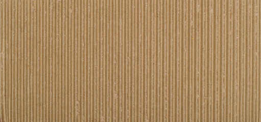 Close-up view of a textured corrugated cardboard surface © sandor