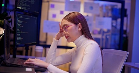 Diverse AI engineers working late in high-tech office, coding algorithms, analyzing data, and building intelligent systems. Focused teamwork and innovation drive future-ready software development.