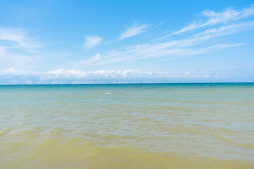 Fototapeta premium Gradient of water color near sandy coast