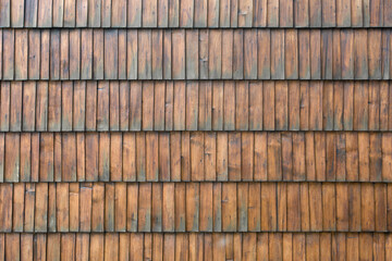 Parquet, small wooden planks as a background, texture, pattern.