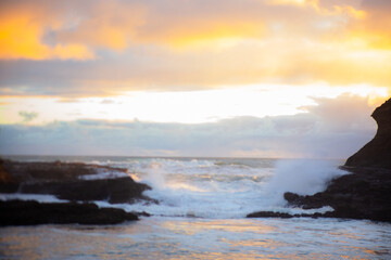 Beautiful lagoon and ocean beach in Piha, Auckland, New Zealand, before sunset.