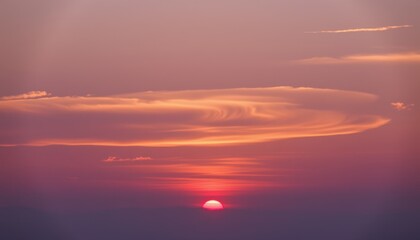 Obraz premium Vibrant Sunset Sky with Pink and Orange Cloudscape Scenic Horizon