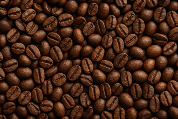 Fototapeta premium Coffee beans background with a steamy cup of espresso in the center.