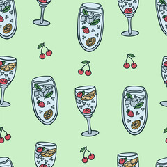 Seamless pattern with hand drawn doodle summer cocktails with berries, citrus, mint leaf, ice cubes in glasses, cherry on light green background