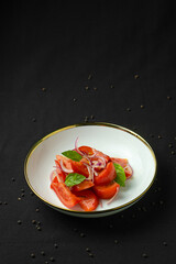 Fresh vegetable salad with radish and cucumbers.