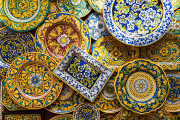 Colorful Sicilian ceramic plates with traditional floral patterns