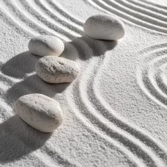 Selbstklebende Fototapeten White stones arranged on a patterned sand surface © Lapak