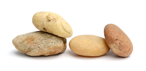 Pebbles with scratches and patterns are isolated on a white background. clipping path