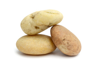 Obraz premium Pebbles with scratches and patterns are isolated on a white background. clipping path