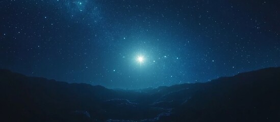 Bright Star over Dark Blue Mountain Range at Night