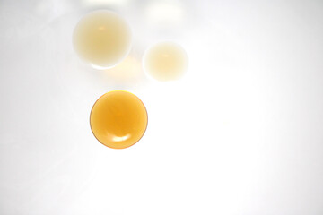 Colorful Abstract Arrangement of Glass Bowls with Liquid Contents