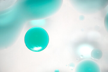 Abstract Background with Floating Blue Bubbles in Soft Light