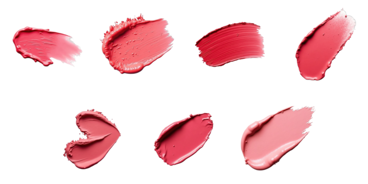 Assorted lipstick smudges in various shades and shapes on transparent background showcasing the texture and application of cosmetic products in beauty and fashion industry