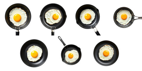 Flatlay composition of multiple frying pans each containing a fried egg with yolk centered isolated on a transparent background for culinary themes