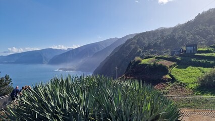 The coastal cliffs of Madeira Island offer breathtaking lookouts overlooking the vast Atlantic Ocean, where rugged rock formations meet endless blue waters. These viewpoints provide visitors with stun