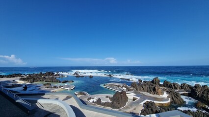 The Natural Pools of Porto Moniz, formed by ancient volcanic rocks, are the signature attraction of this charming coastal town in Madeira. These crystal-clear pools are naturally filled with fresh sea