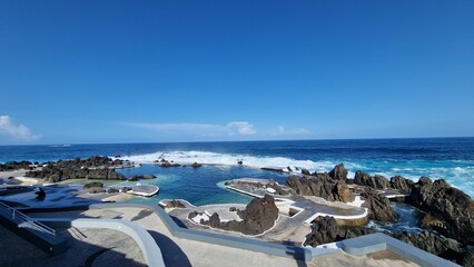 The Natural Pools of Porto Moniz, formed by ancient volcanic rocks, are the signature attraction of this charming coastal town in Madeira. These crystal-clear pools are naturally filled with fresh sea