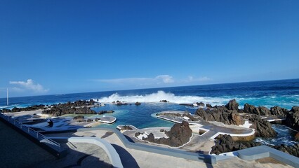 The Natural Pools of Porto Moniz, formed by ancient volcanic rocks, are the signature attraction of this charming coastal town in Madeira. These crystal-clear pools are naturally filled with fresh sea