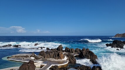 The Natural Pools of Porto Moniz, formed by ancient volcanic rocks, are the signature attraction of this charming coastal town in Madeira. These crystal-clear pools are naturally filled with fresh sea
