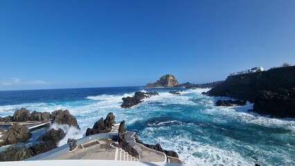 The Natural Pools of Porto Moniz, formed by ancient volcanic rocks, are the signature attraction of this charming coastal town in Madeira. These crystal-clear pools are naturally filled with fresh sea