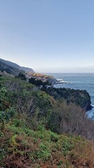 The Véu da Noiva viewpoint allows you to admire this abundant waterfall that erupts from the vegetation-covered slope, falling towards the sea.