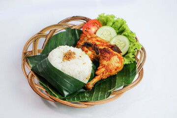 Ayam bakar is an Indonesian dish, consisting of charcoal-grilled chicken. Ayam bakar literally means 