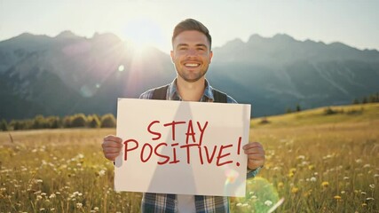 Man in nature promotes positivity with cheerful message