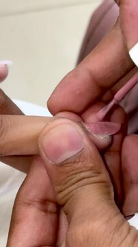 processer of nail polish application in the beauty salon