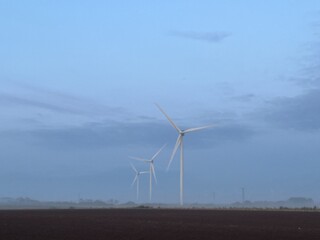 Fototapeta premium wind turbine in the fog