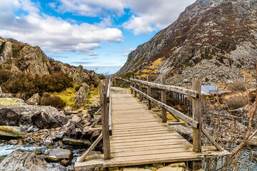 A view of over a bridge looking down the path leading to Lake Idwal in the foothills of Snowdonia...