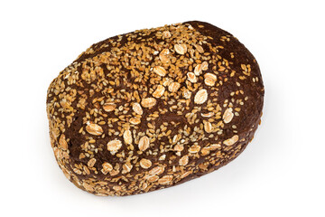 Brown bread decorated with sesame and flax seeds and flakes