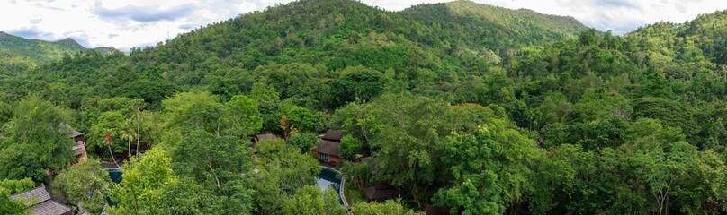 Panorama of houses in the tropical green forest of Southeast Asia at Chiang Mai, Thailand