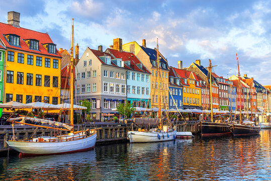 Copenhagen, Denmark: Old Nyhavn harbour with ships and colorful buildings, Old Town, Europe