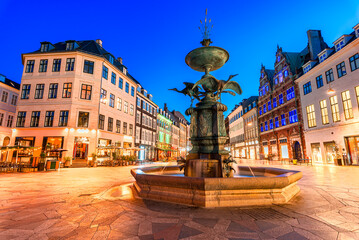 Copenhagen, Denmark: Stork Fountain in Stroget shopping district on Amagertorv, Amager Square,  the longest pedestrian street in the world