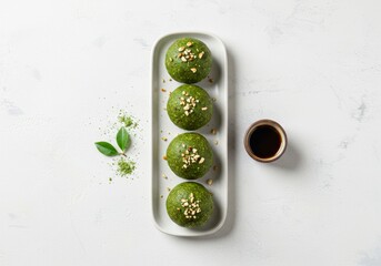 Zenith View of Matcha Energy Bites on Platter with Soy Sauce Dipping Cup