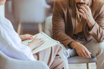 Counseling Session Between Therapist and Client in a Comfortable Office Space